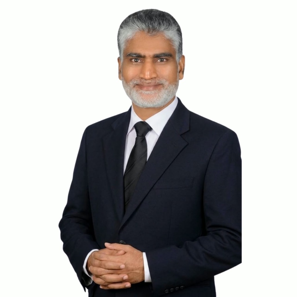 Dr. Hussain P